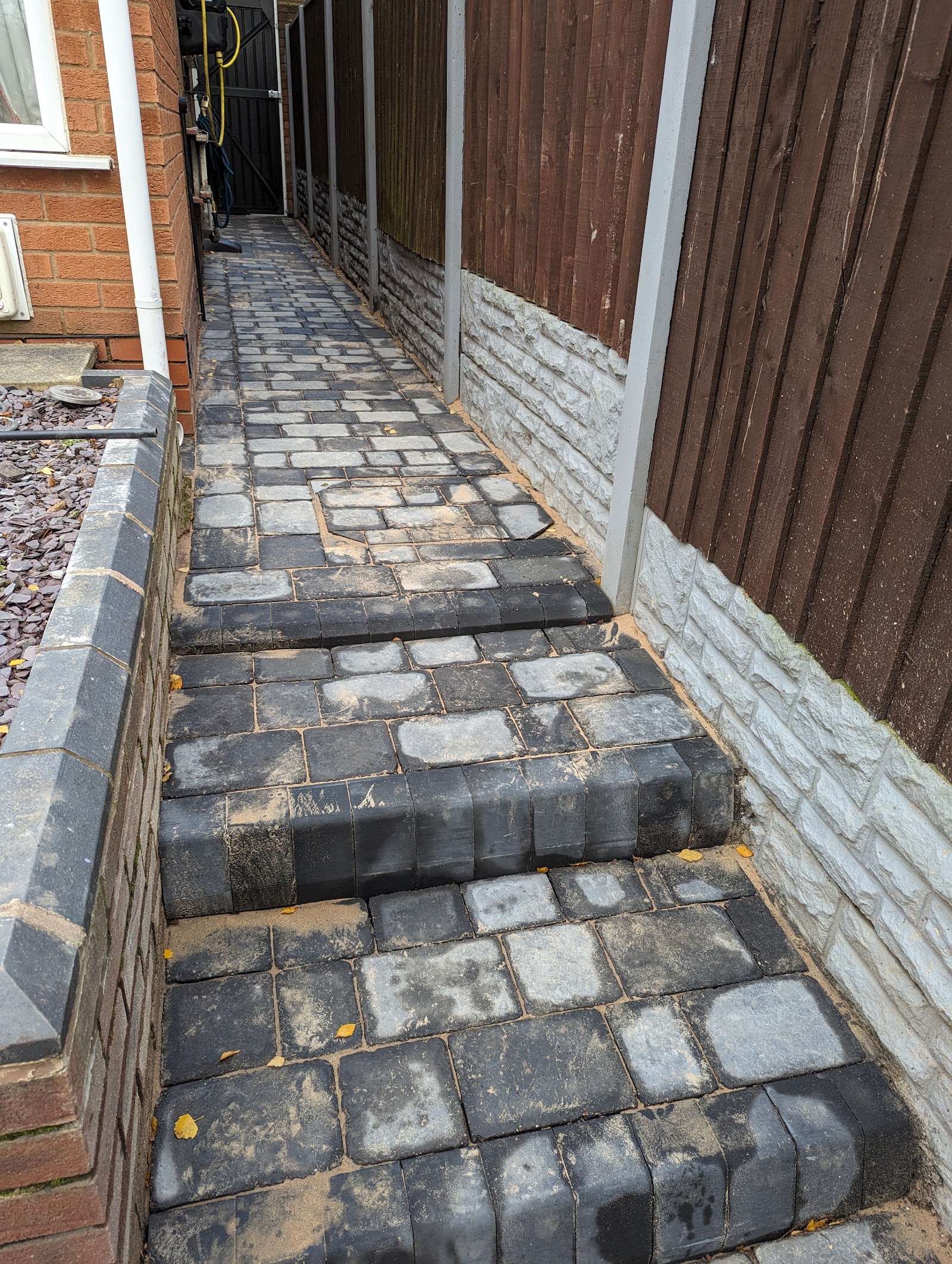 Block-paved patio and steps at the rear of a Walsall home